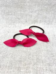 Ceriserosa läderrosett-gummiband