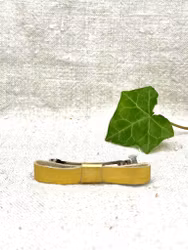 Hårklämma, liten med guldig läderrosett