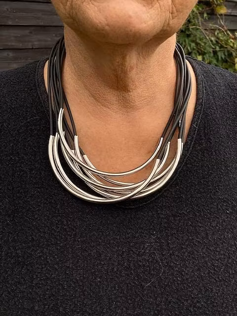 Elixa  7-radigt Halsband EL125-6562 i stål och gummi