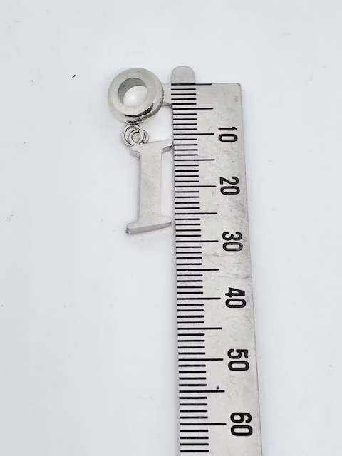 I Bokstav i stål Design Bud to rose hos EriCsson Ur och Guld