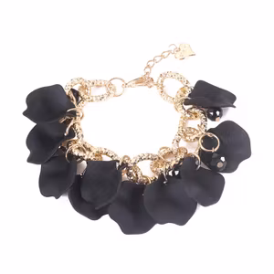 Partyarmband i guld med svarta berlocker