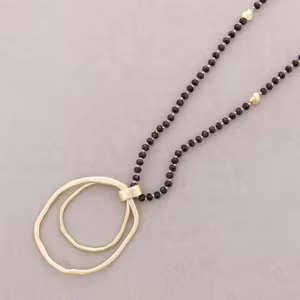 Halsband långt svart guldhänge Sonata