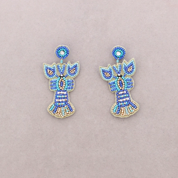 Örhänge i form av en hummer dekorerad i blåa toner Stort örhänge