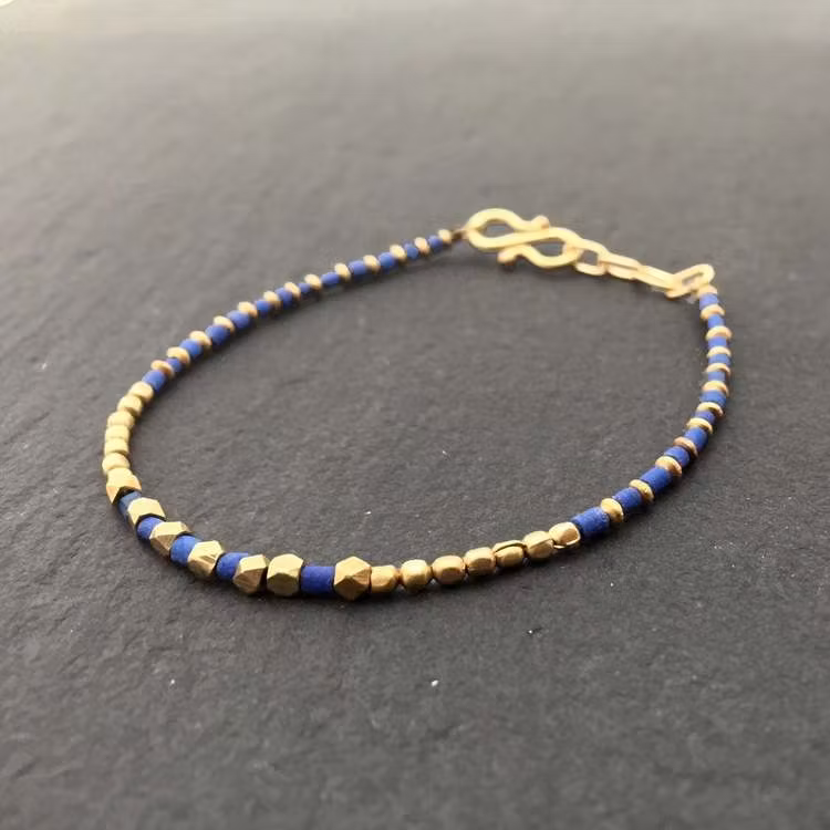 TURKOS ARMBAND I MÄSSING
