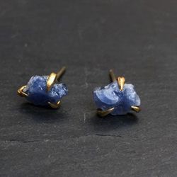 PAR CLAWSTUDS MED SAFIR I MÄSSING