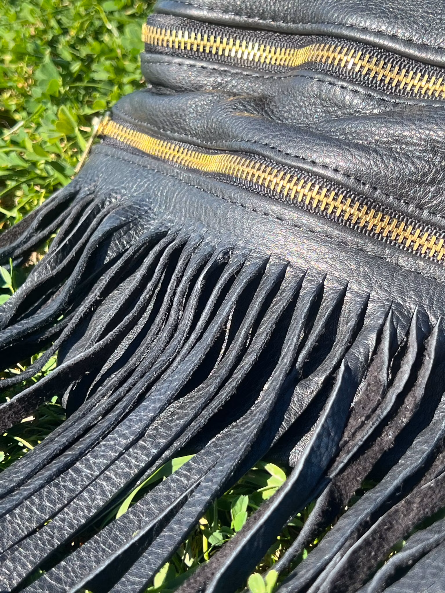 WANDERLUST VÄSKA I SVART LÄDER MED FRANSAR