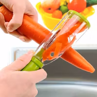 Frukt- och grönsaksskalare  metall knife med behållare