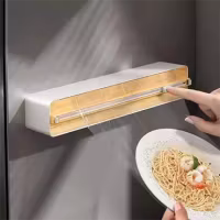Plastfolie dispenser med glidklippare