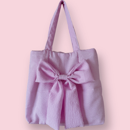 Handsydd tygpåse med rosett - rosa med ränder