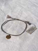 Armbånd (brunbeige med firkløver) fra Jewel Rocks