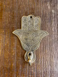 Hängare Fatima's hand