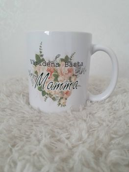 Mugg Världens Bästa Mamma med en blomma bakom