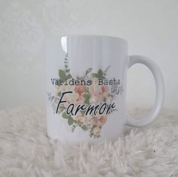 Mugg Världens Bästa Farmor med en blomma