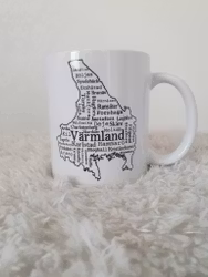 Värmlandsmugg med orter i en kartkontur
