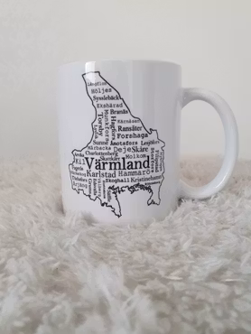 Värmlandsmugg med orter i en kartkontur