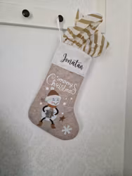 Julstrumpa Snögubbe med ett paket