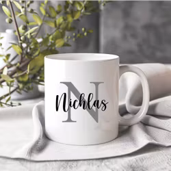 Bokstavsmugg med stor bokstav med namn