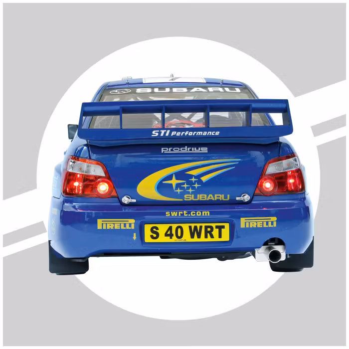 Vattenskadad låda - Skala 1/8 Subaru Impreza Solberg/Mills in metal, w light, etc. fr Ixo Collections - Di