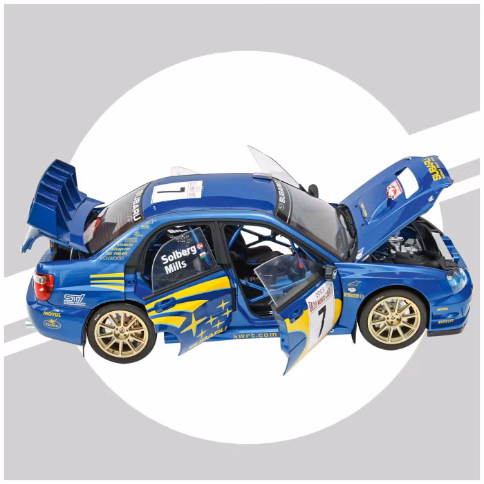Vattenskadad låda - Skala 1/8 Subaru Impreza Solberg/Mills in metal, w light, etc. fr Ixo Collections - Di