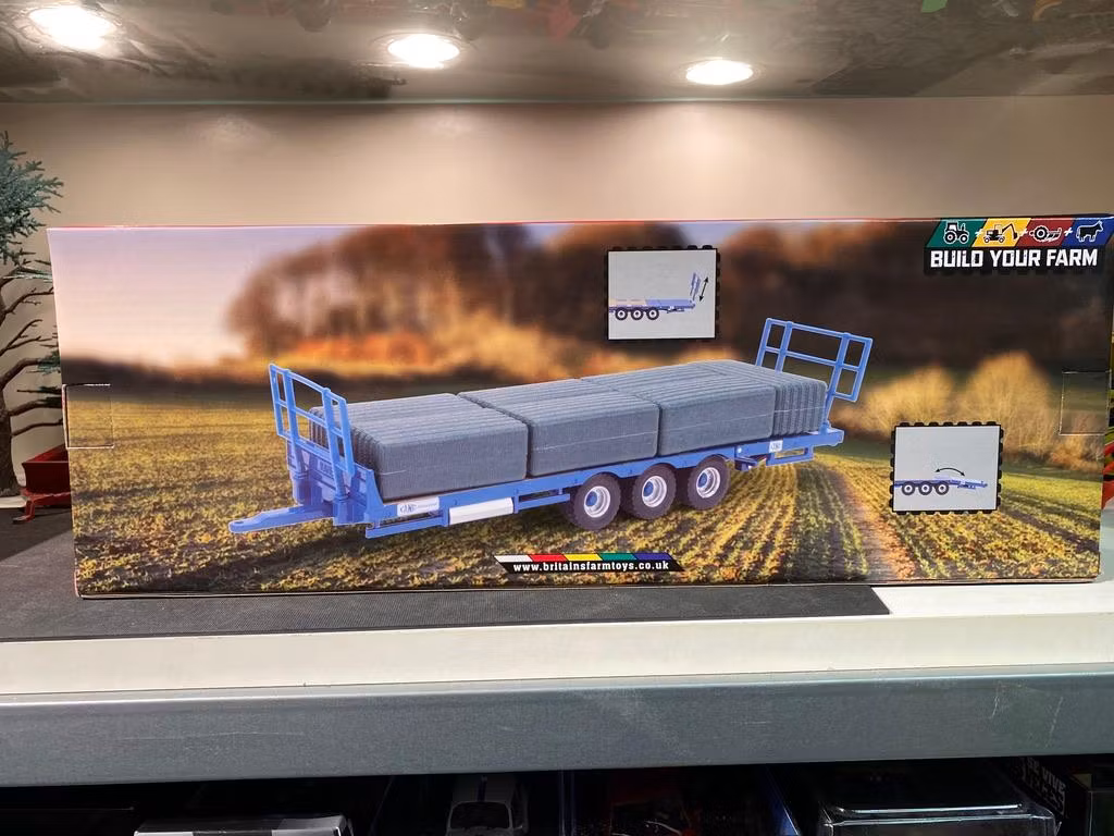 Skala 1/32 Britains Kane bal trailer med 7 balar