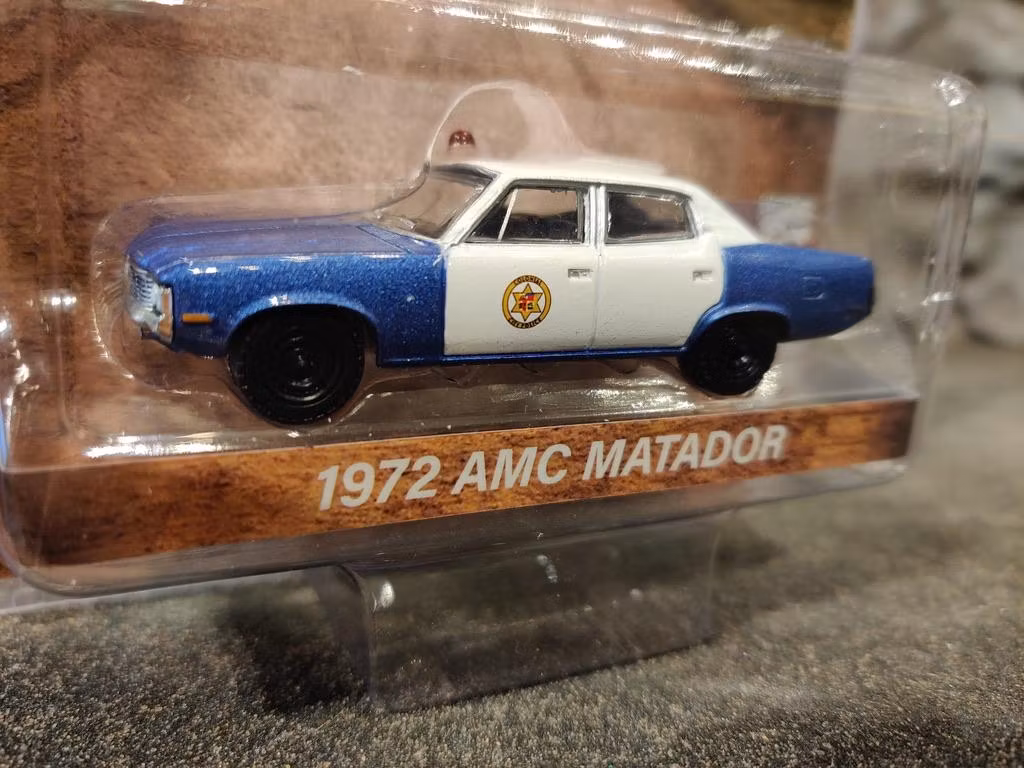 Skala 1/64 AMC Matador 72' Colonial City Police' från Greenlight Excl.