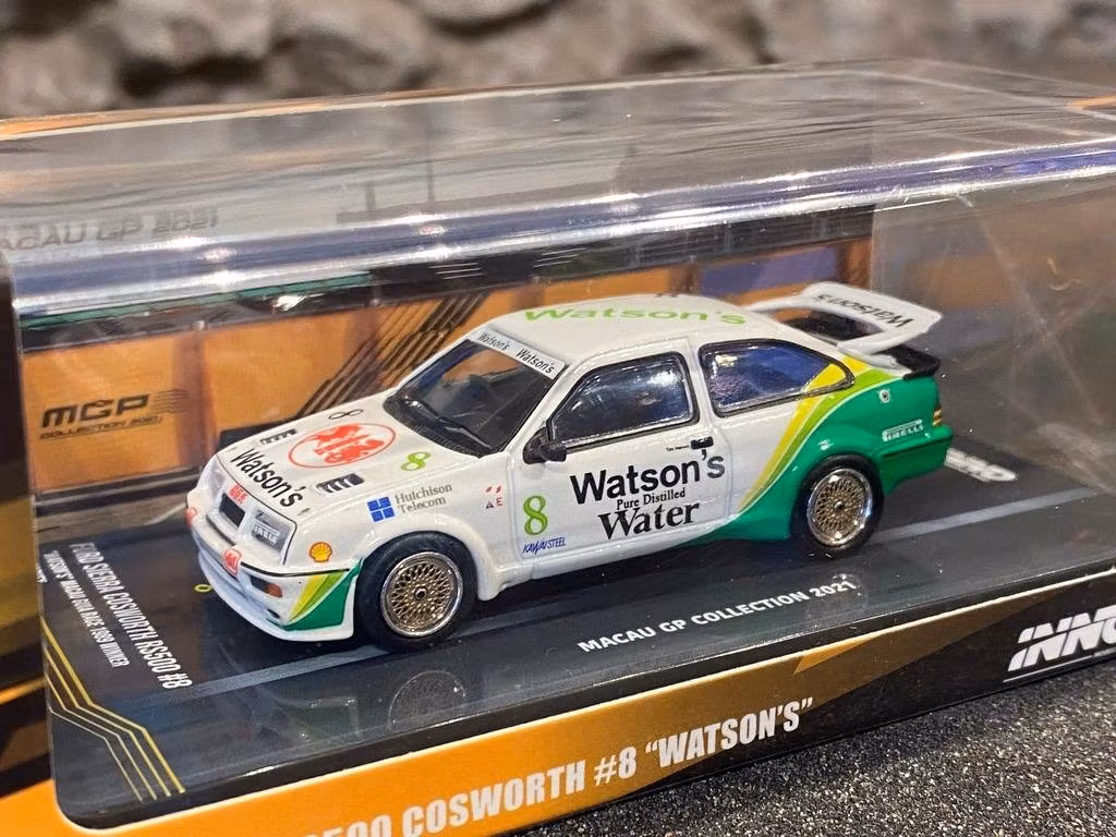 REA! Skala 1/64 Ford Sierra RS500 Cosworth, Macau GP Coll. 21' fr Inno64