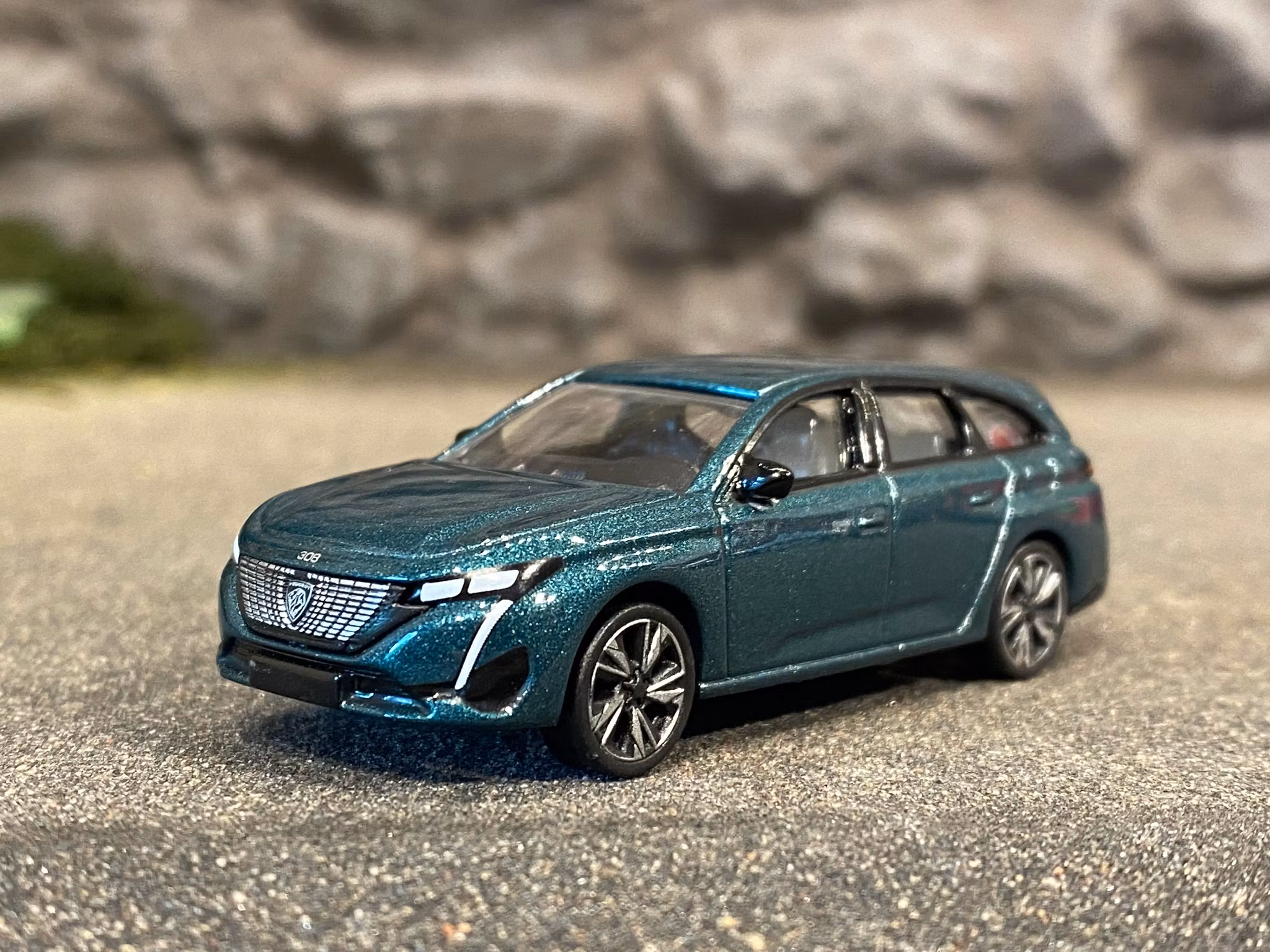 Skala 1/64 Peugeot 308 SW, 2021' Avatar blå (grönaktig), från NOREV