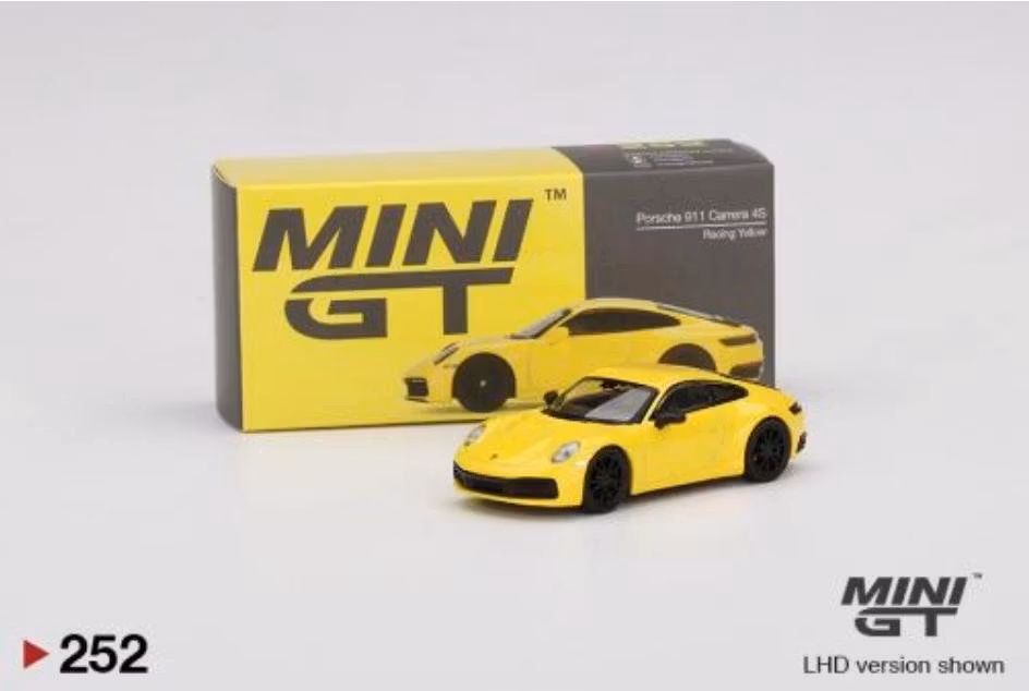 Skala 1/64 - Porsche 911 Carrera 4S Racinggul från MINI GT