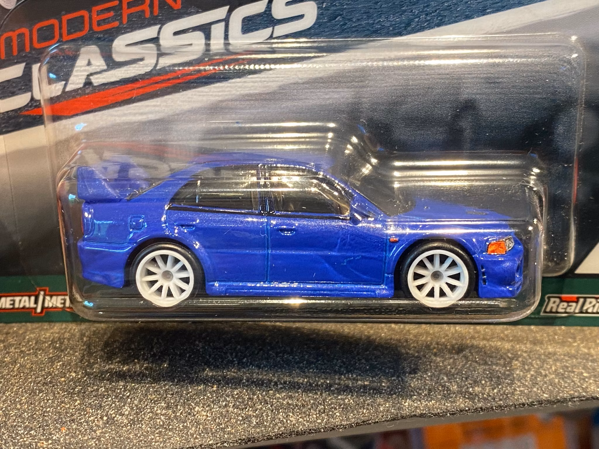 Skala 1/64 Hot Wheels PREMIUM - Modern Classics: Mitsubishi Lancer Evo VI