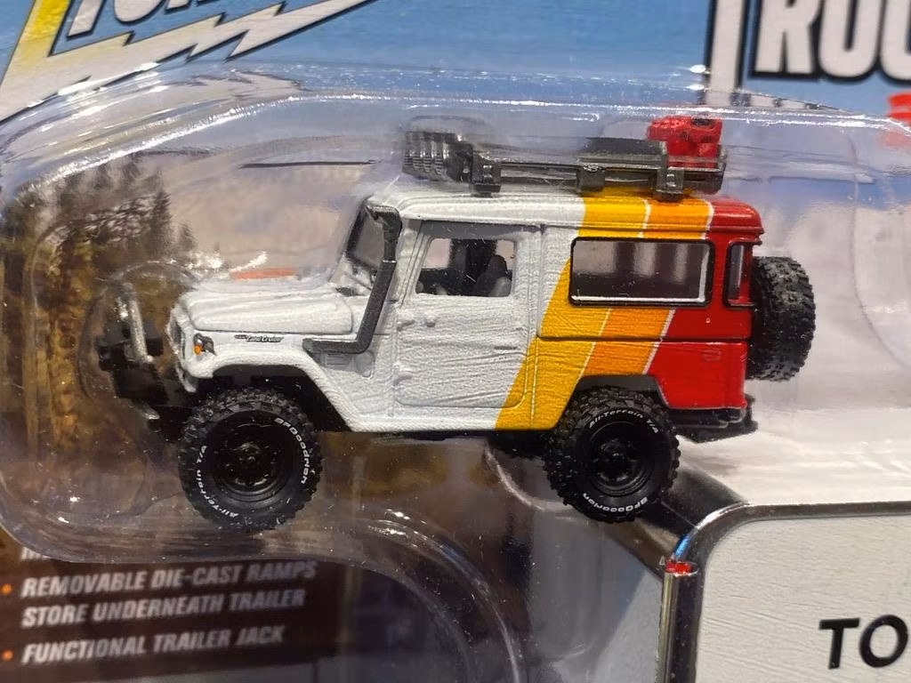 Skala 1/64 Urhäftig Toyota Land Cruiser 80' m släp fr Johnny Lightning MiJo excl