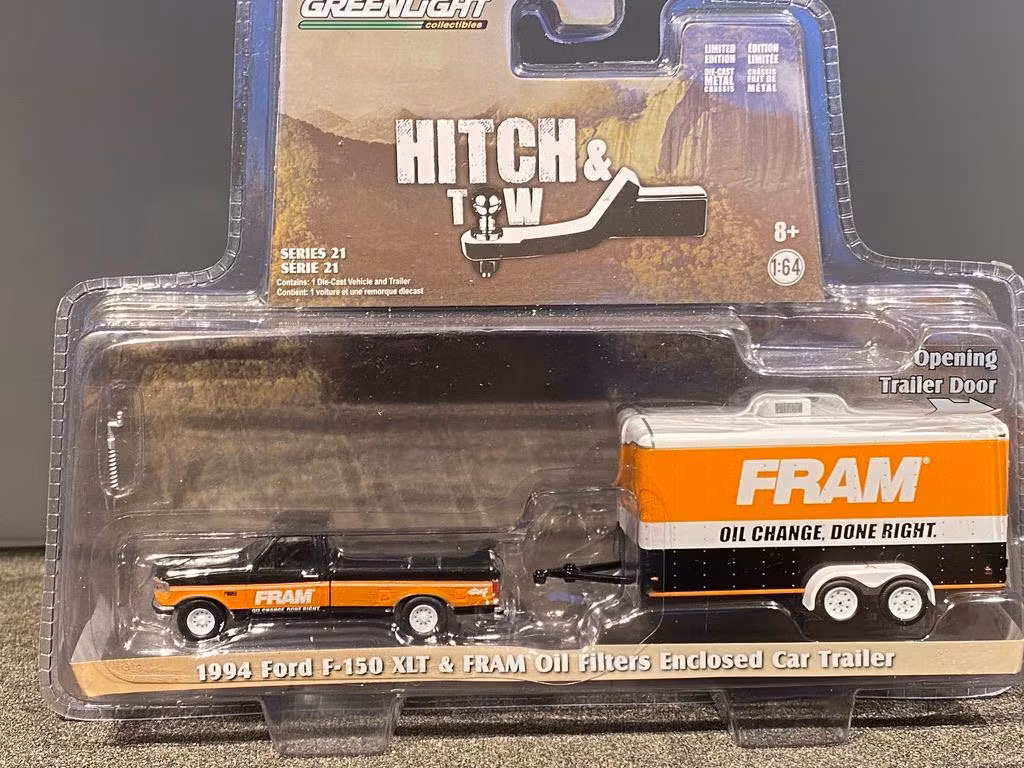 Skala 1/64 Ford F-150 XLT 94' & "FRAM"-Trailer fr GreenLight