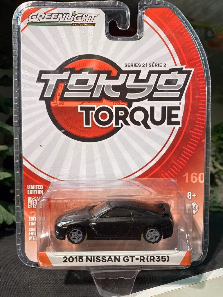 Skala 1/64 Nissan GT-R (R35) 15' svart "Tokyo Torque" från Greenlight