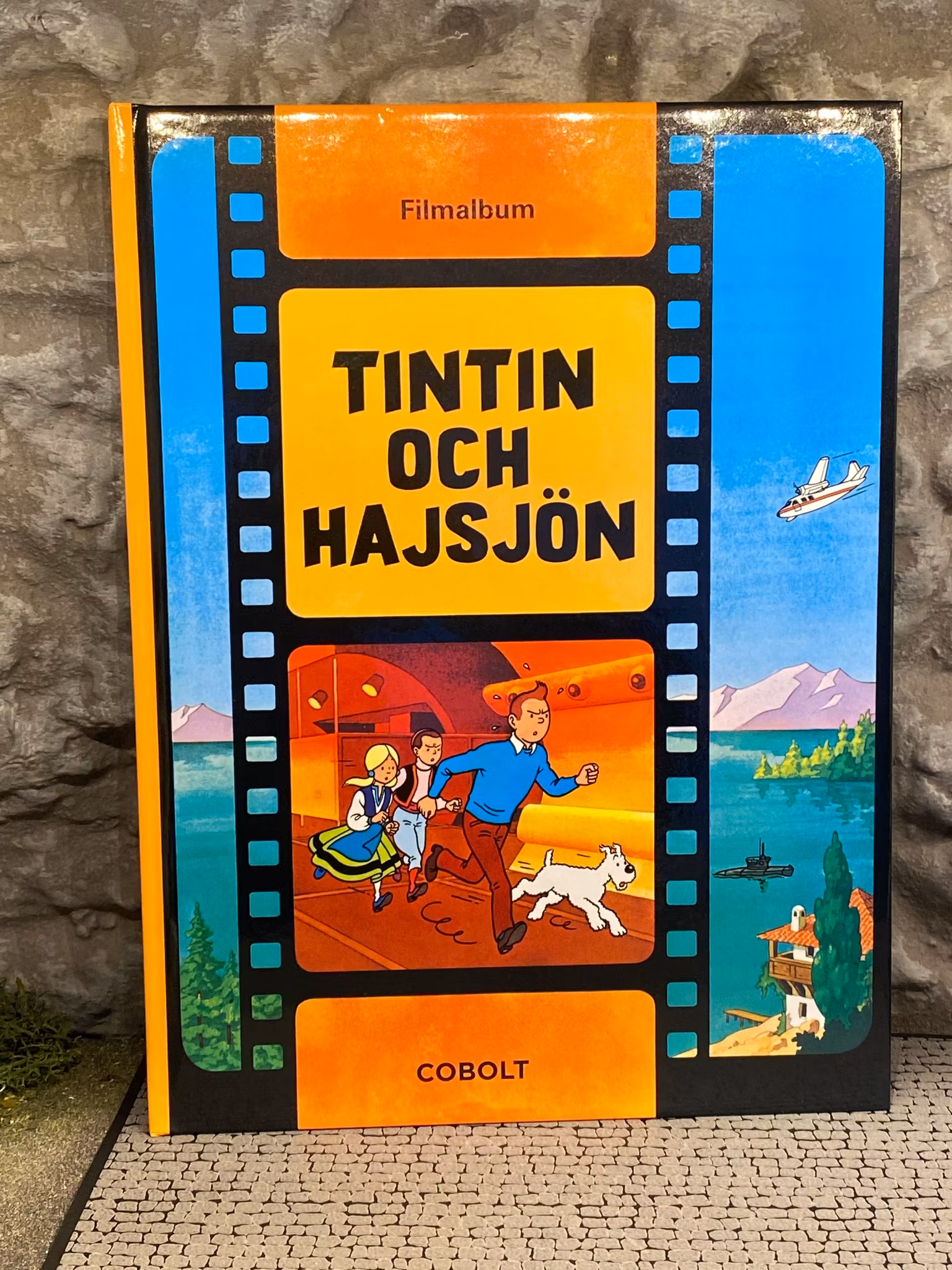 Tintins äventyr - Filmalbum, Tintin i Hajsjön - Herge