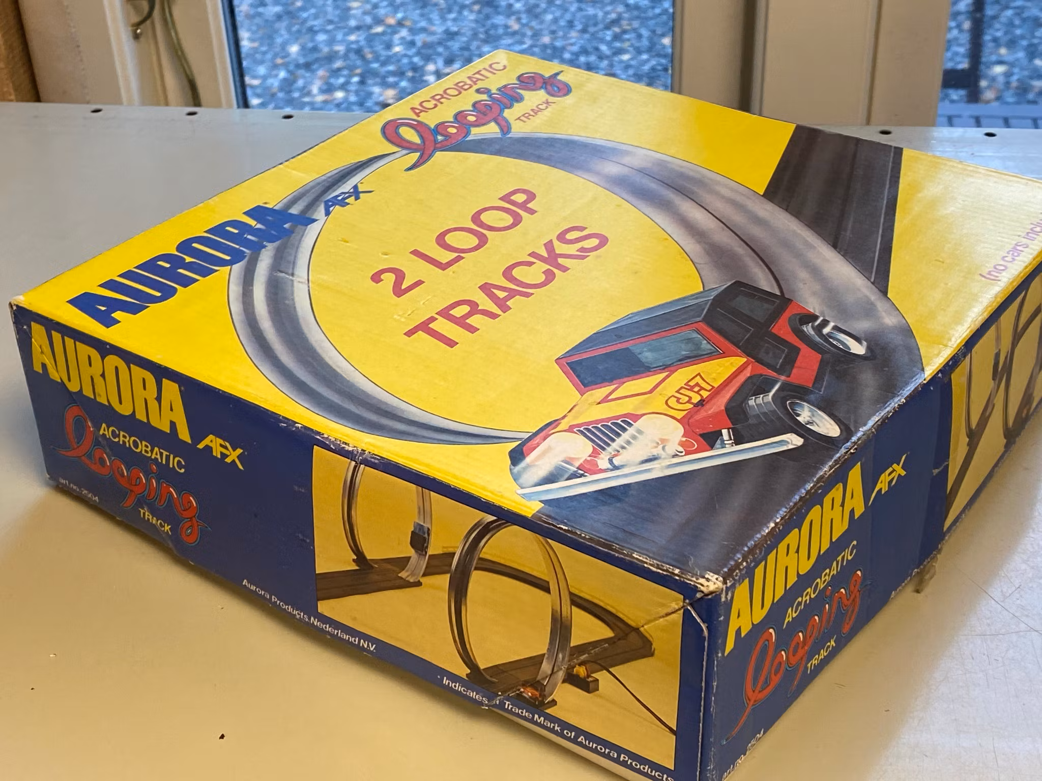 Till Bilbana: Aurora AFX Acrobatic Looping Track -  2 loopar (1 per spår)