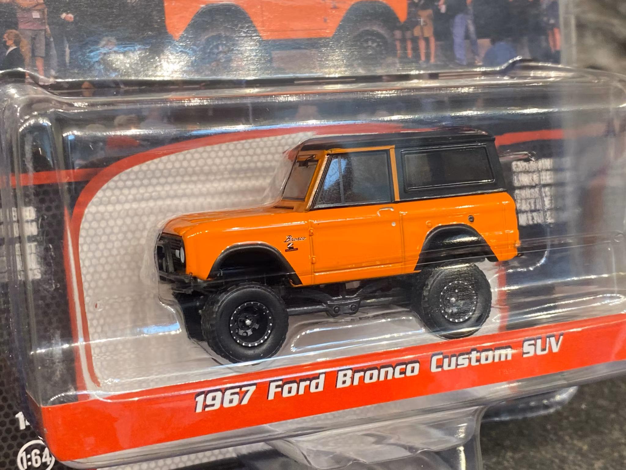 Skala 1/64 Ford Bronco Custom SUV 67' Barrett Jackson auctions från Greenlight