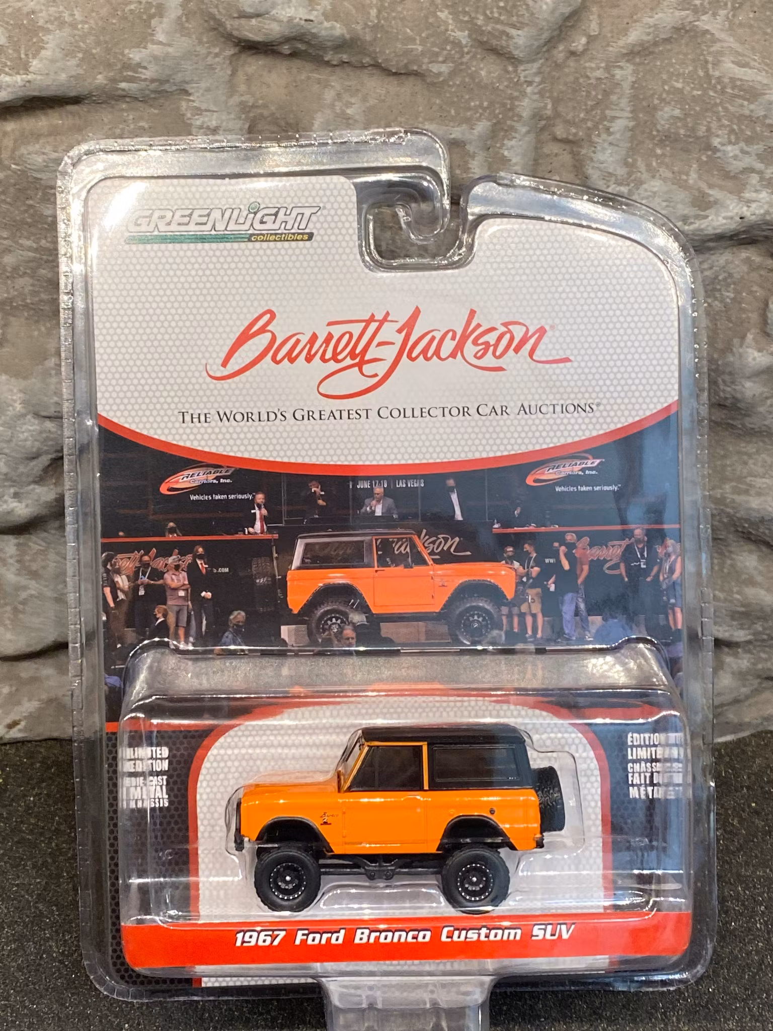 Skala 1/64 Ford Bronco Custom SUV 67' Barrett Jackson auctions från Greenlight