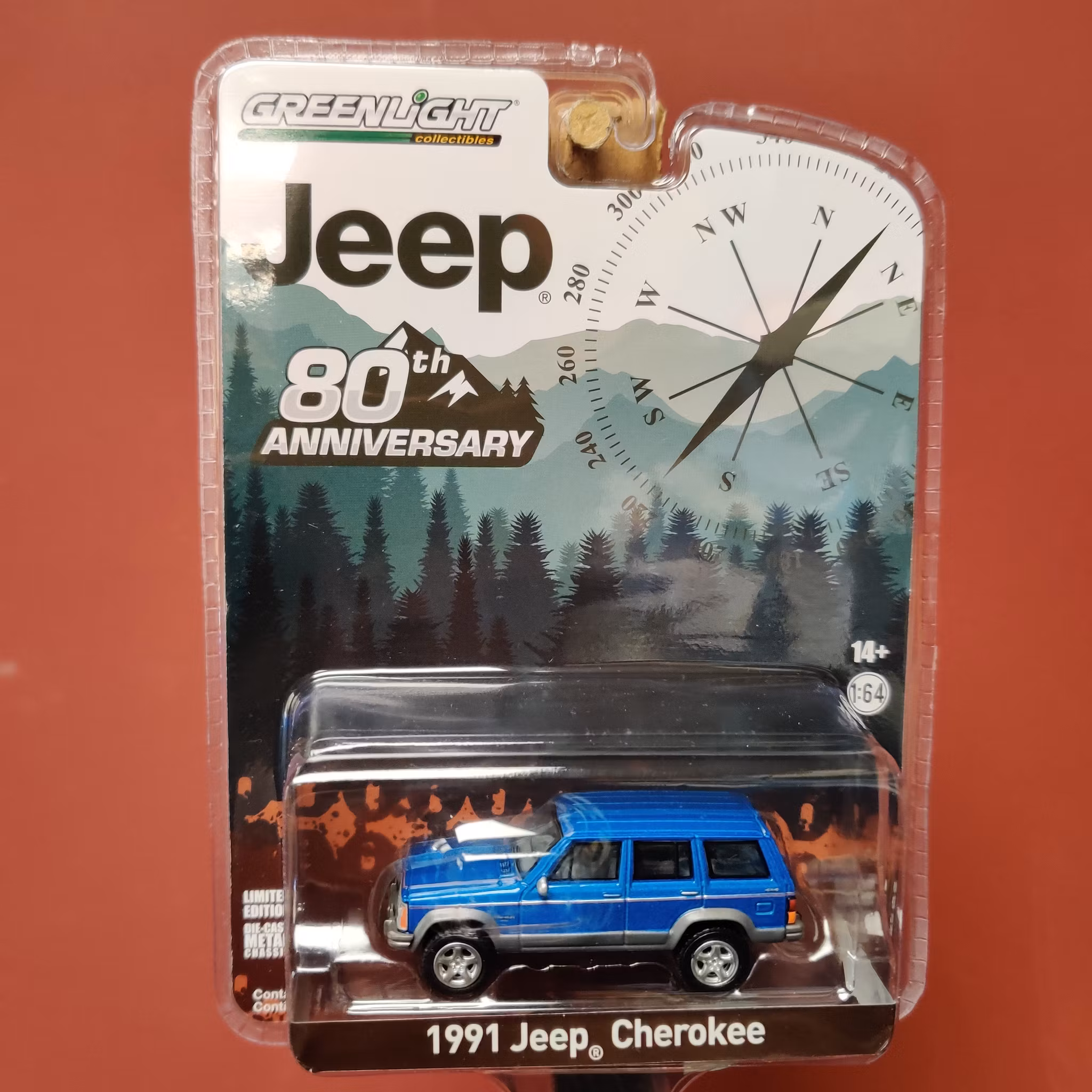 Skala 1/64 Jeep Cherokee 91' - "Jeep 80th Anniversary" från Greenlight