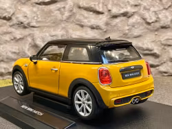 Skala 1/18 New Mini Hatch, Orange m Svart tak från Nex-models/Welly