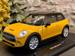 Skala 1/18 New Mini Hatch, Orange m Svart tak från Nex-models/Welly