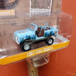 Skala 1/64 - Ford Bronco 67' "Smokey Bear" Ser.1 från GreenLight