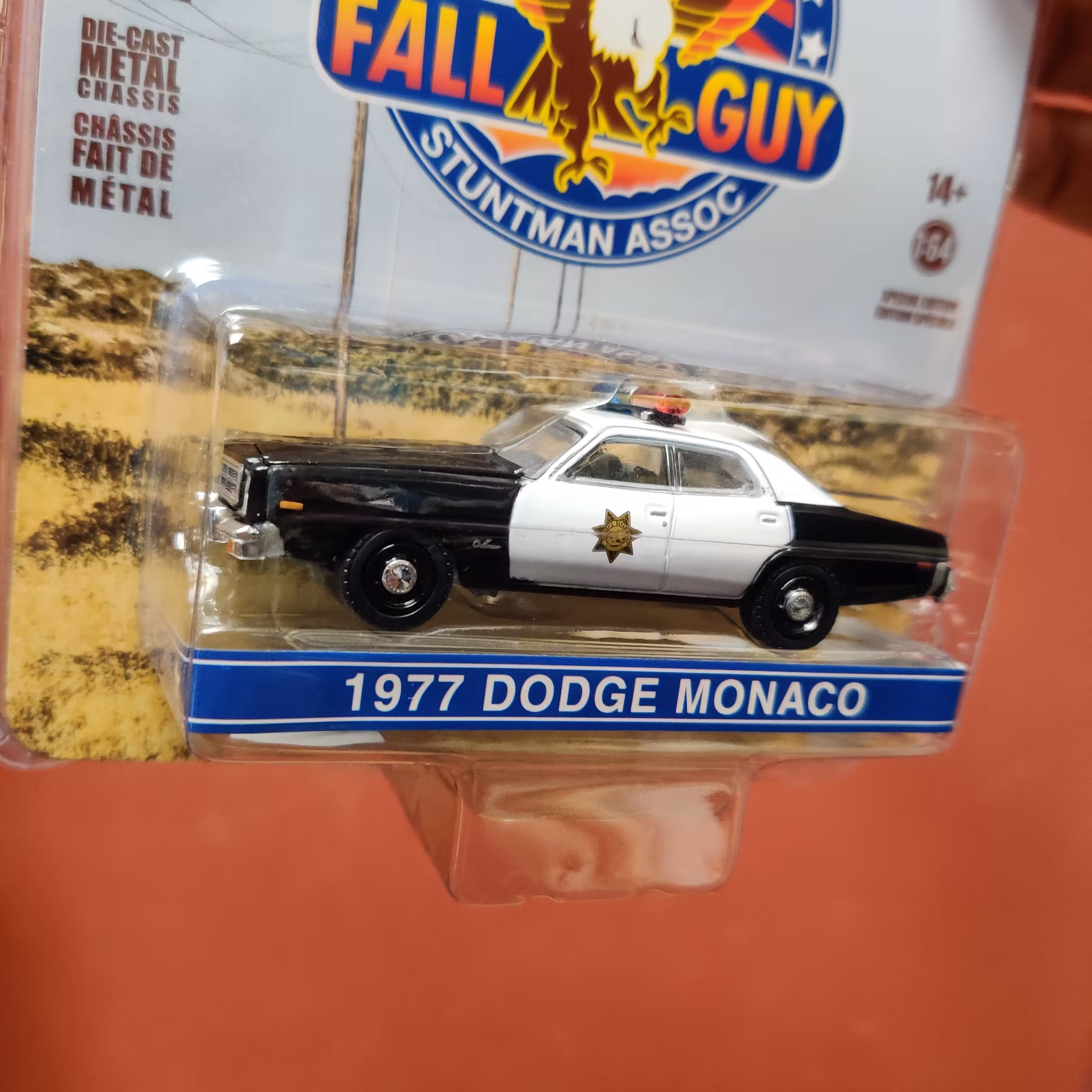 Skala 1/64 Dodge Monaco 77' "Fall Guy Stuntman Assoc" fr GreenLight Hollywood
