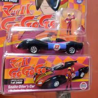 Skala 1/64 Snake Oiler's Bil med Snake Oiler figur från Johnny Lightning