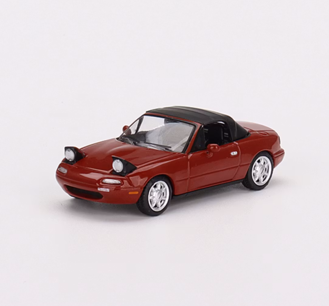 Skala 1/64 - Mazda Miata MX-5 (NA) röd, Uppfälld softtop & Ljus Vä styrd, fr MINI GT