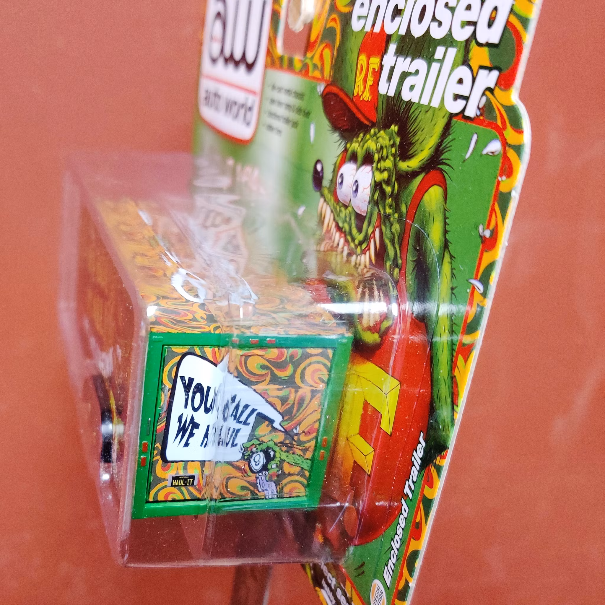 Skala 1/64 - Stängd Bil-Trailer, "We Haul It All Rat Fink" från Auto World