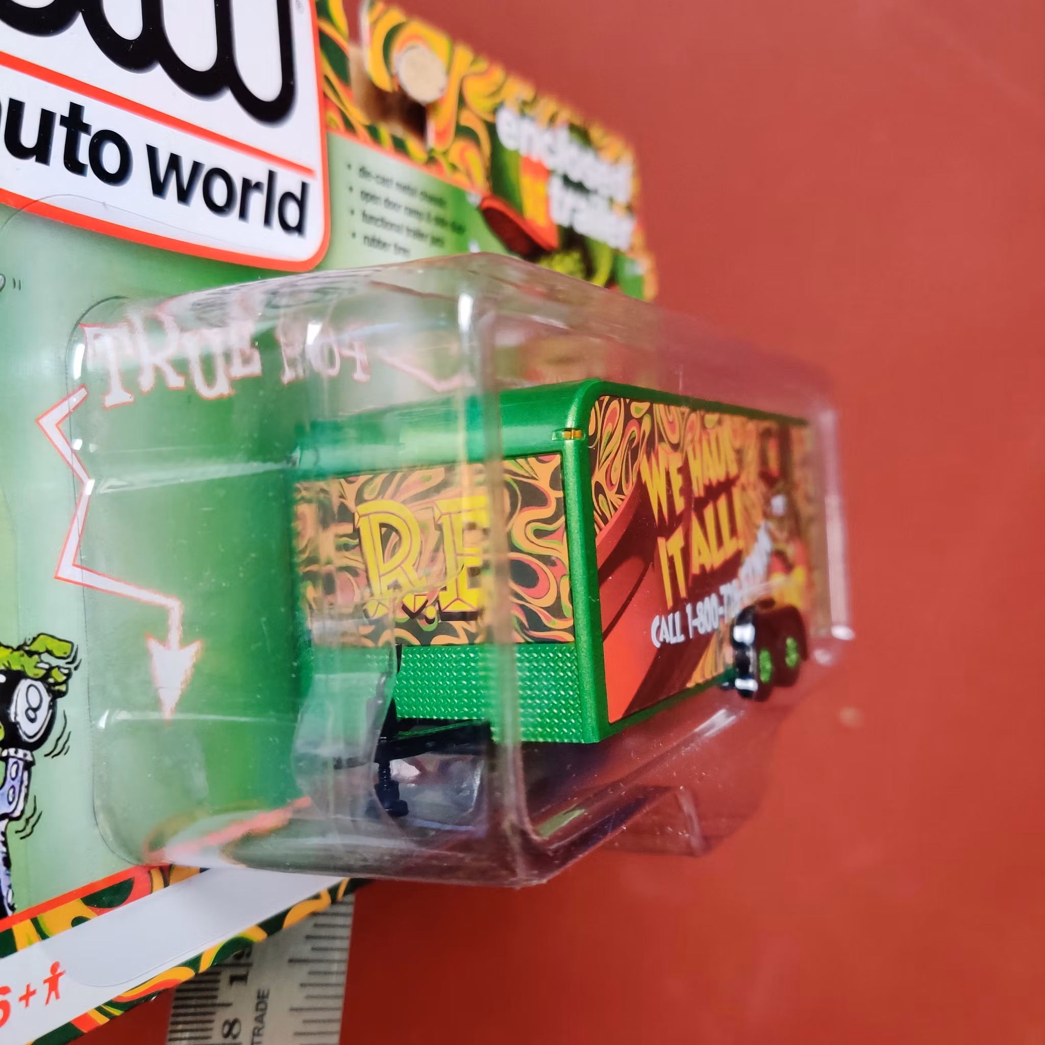 Skala 1/64 - Stängd Bil-Trailer, "We Haul It All Rat Fink" från Auto World