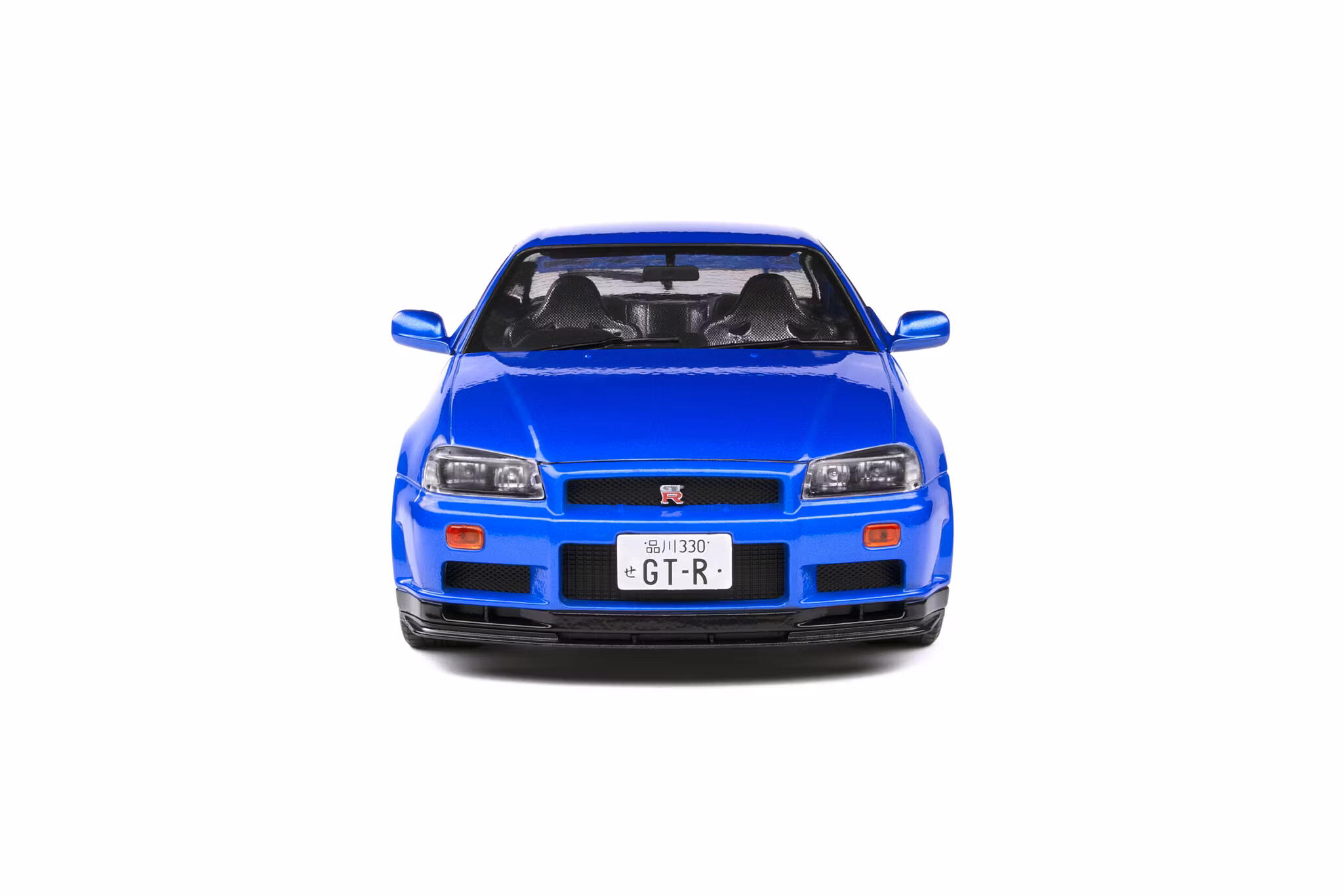Skala 1/18 NISSAN SKYLINE GT-R (R34) – BAYSIDE BLUE – 1999 fr Solido