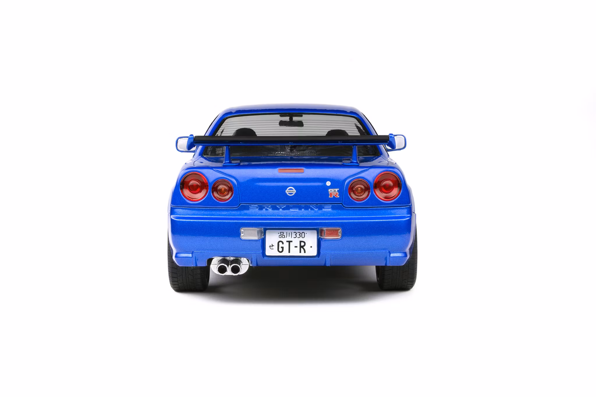 Skala 1/18 NISSAN SKYLINE GT-R (R34) – BAYSIDE BLUE – 1999 fr Solido