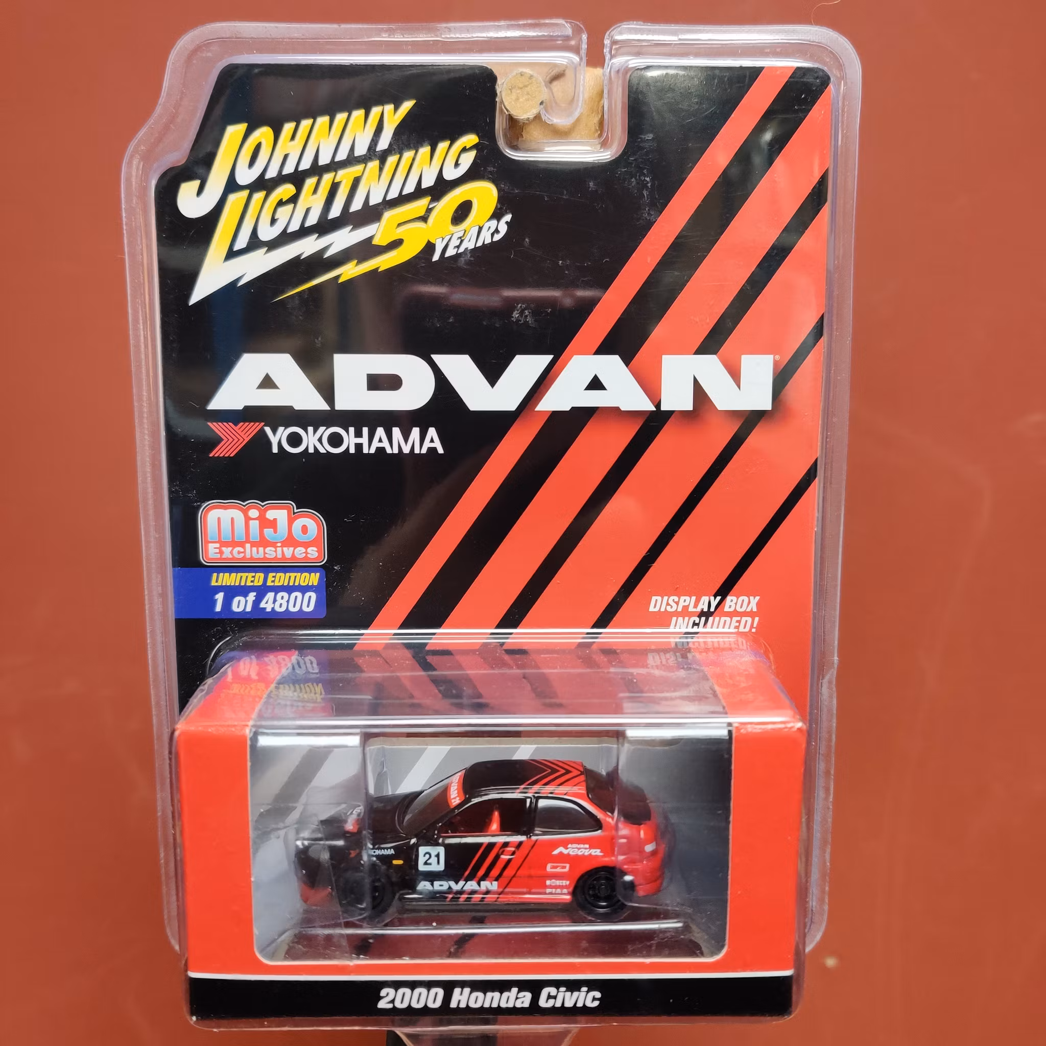 Skala 1/64 Honda Civic 2000 ADVAN YOKOHAMA, svart/röd fr AUTO WORLD Lim ed