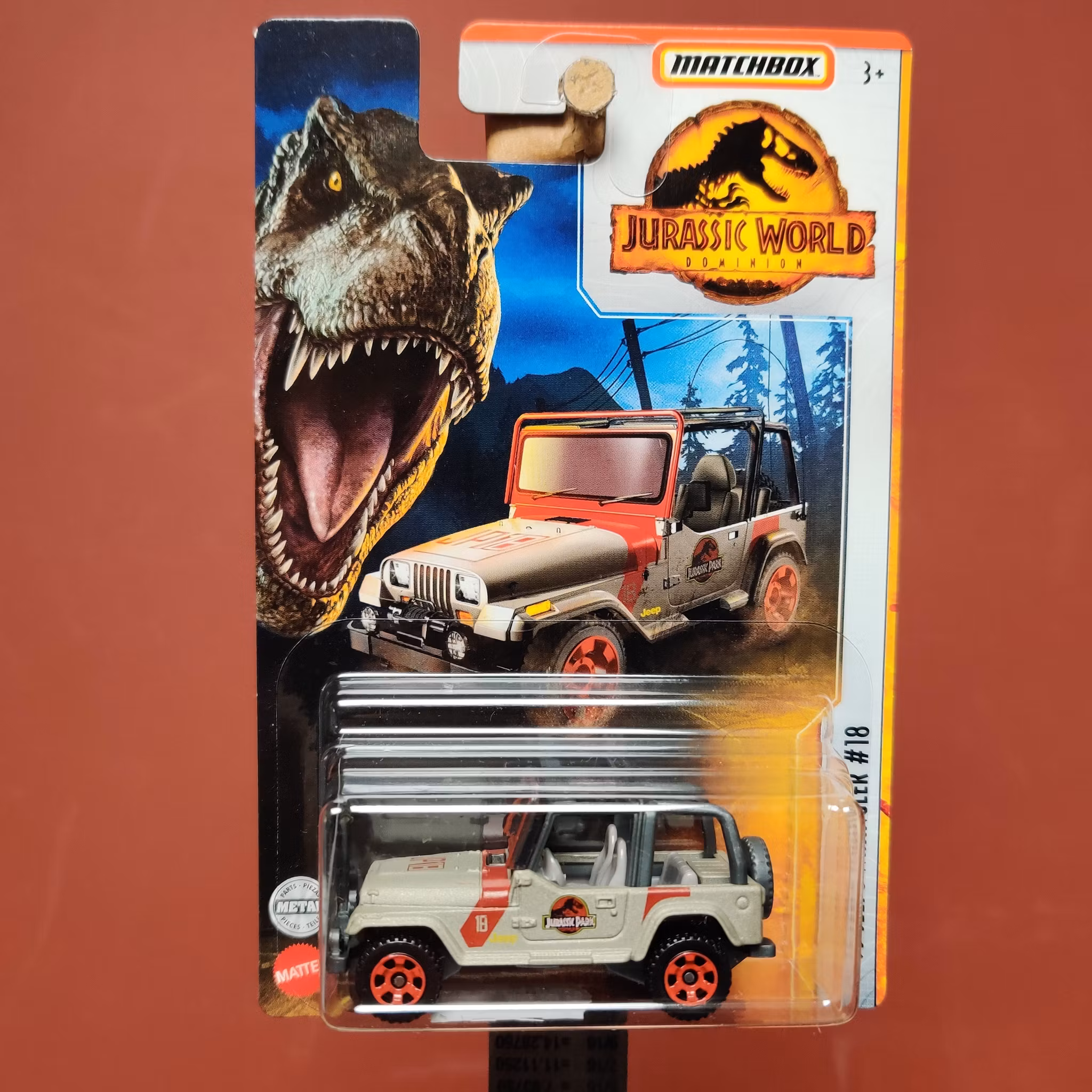 Skala 1/64 Matchbox: Jeep Wrangler #18 1993 "Jurassic World"