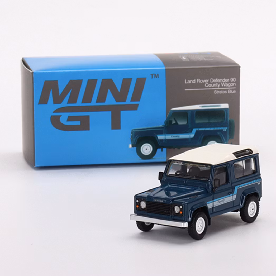 Skala 1/64 Land Rover Defender 90 County Wagon, Stratos Blue fr MINI GT